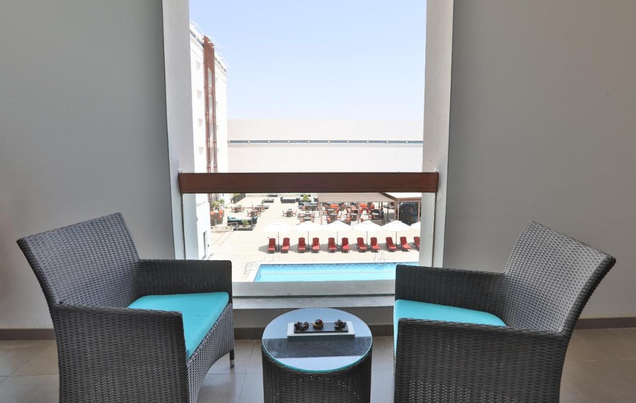 Four Points By Sheraton Al Ain Exterior photo A balcony at the hotel