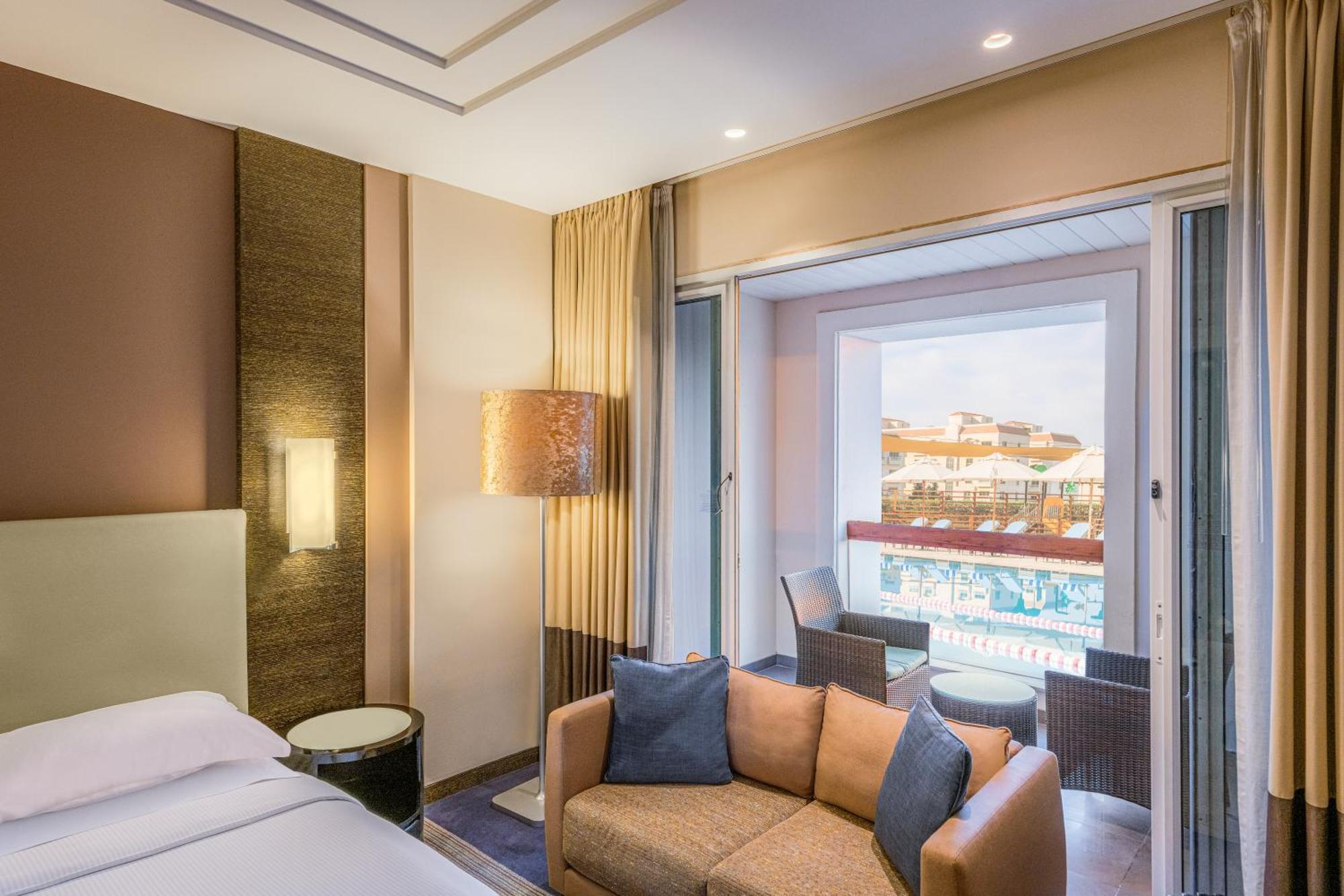 Four Points By Sheraton Al Ain Exterior photo Deluxe Room with Pool Access