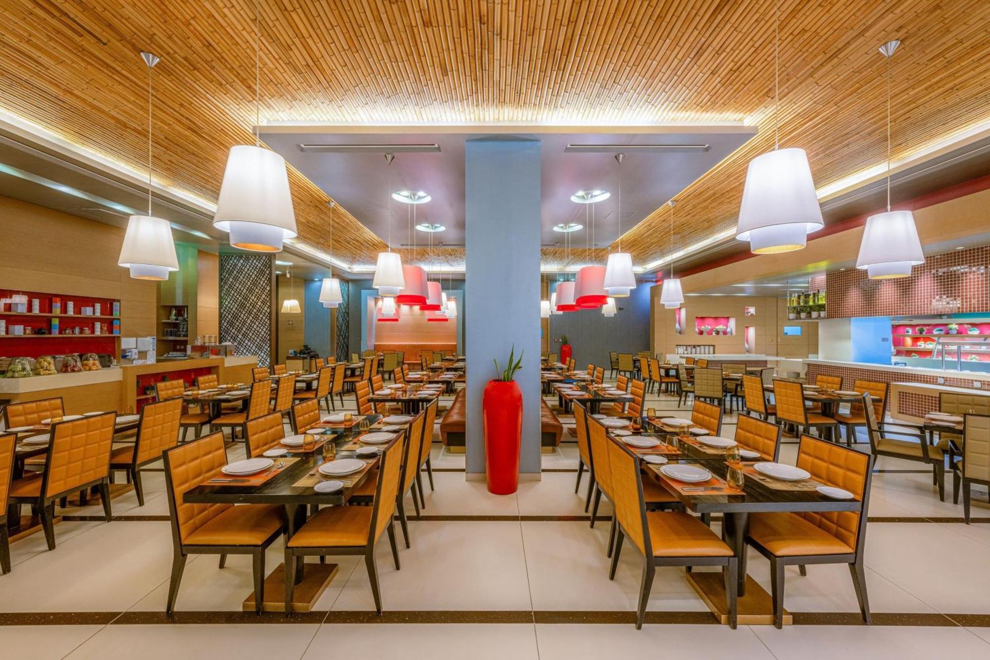 Four Points By Sheraton Al Ain Exterior photo The interior of a typical buffet restaurant