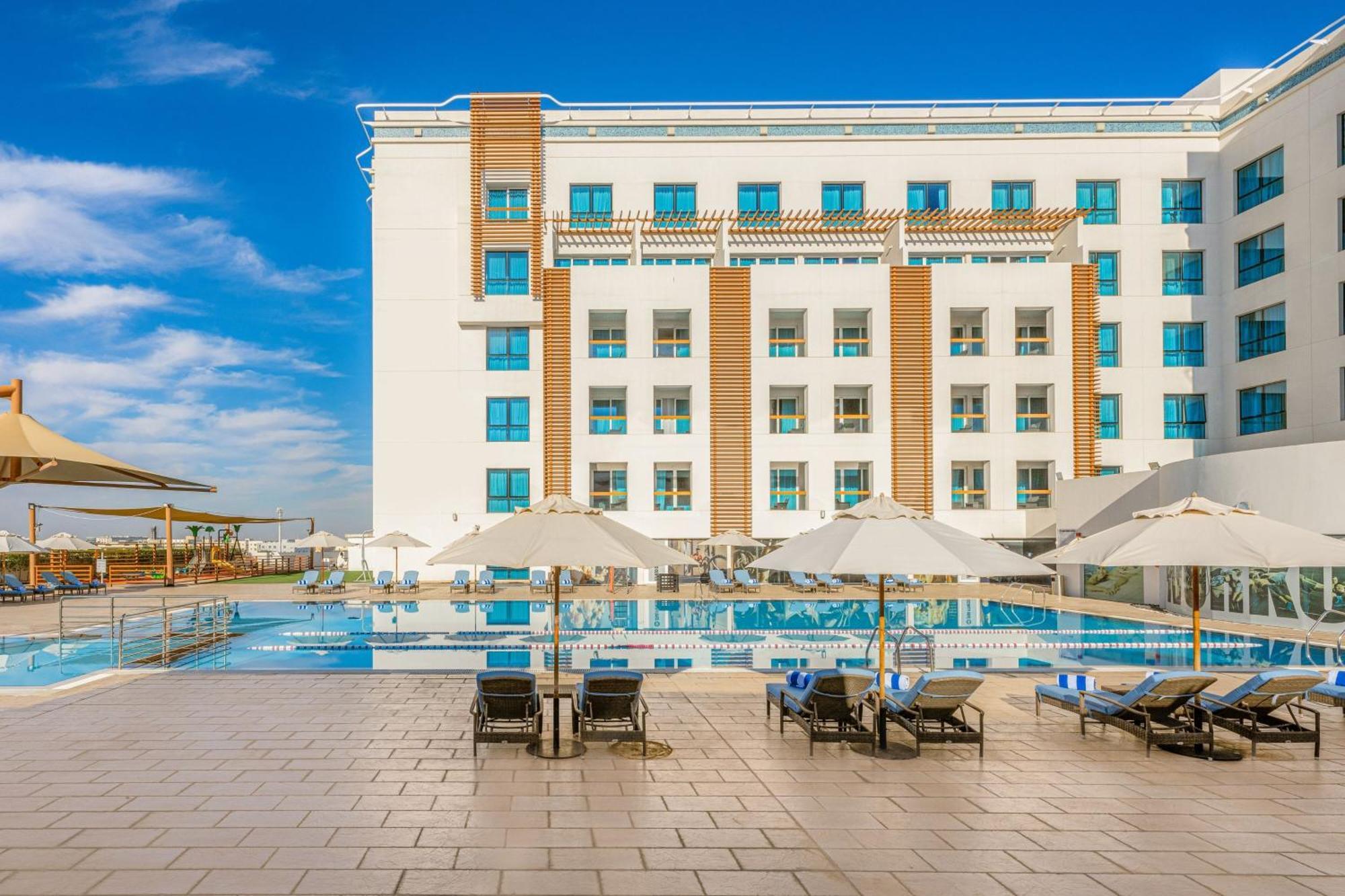 Four Points By Sheraton Al Ain Exterior photo The hotel's pool