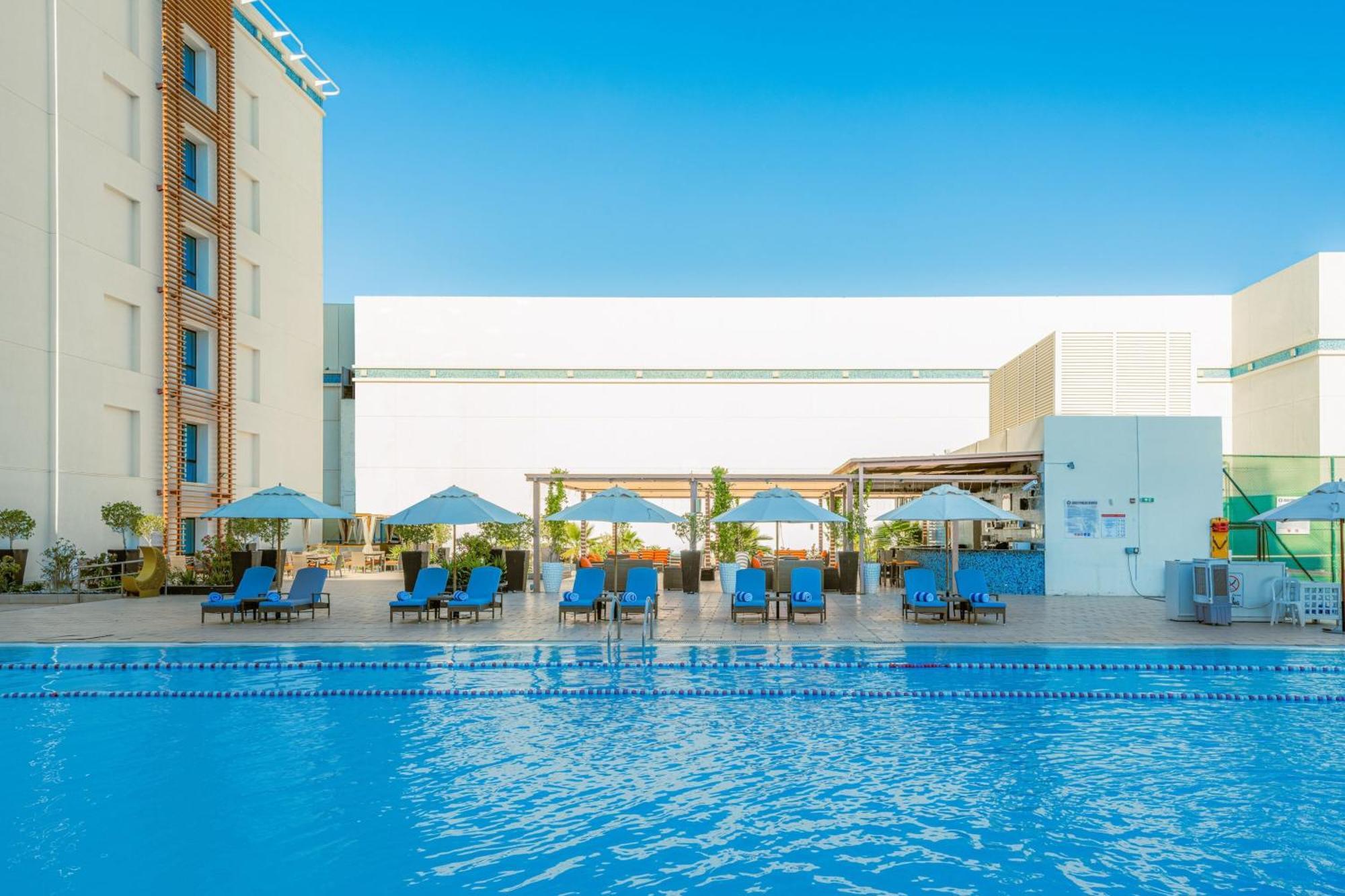 Four Points By Sheraton Al Ain Exterior photo The swimming pool at the hotel