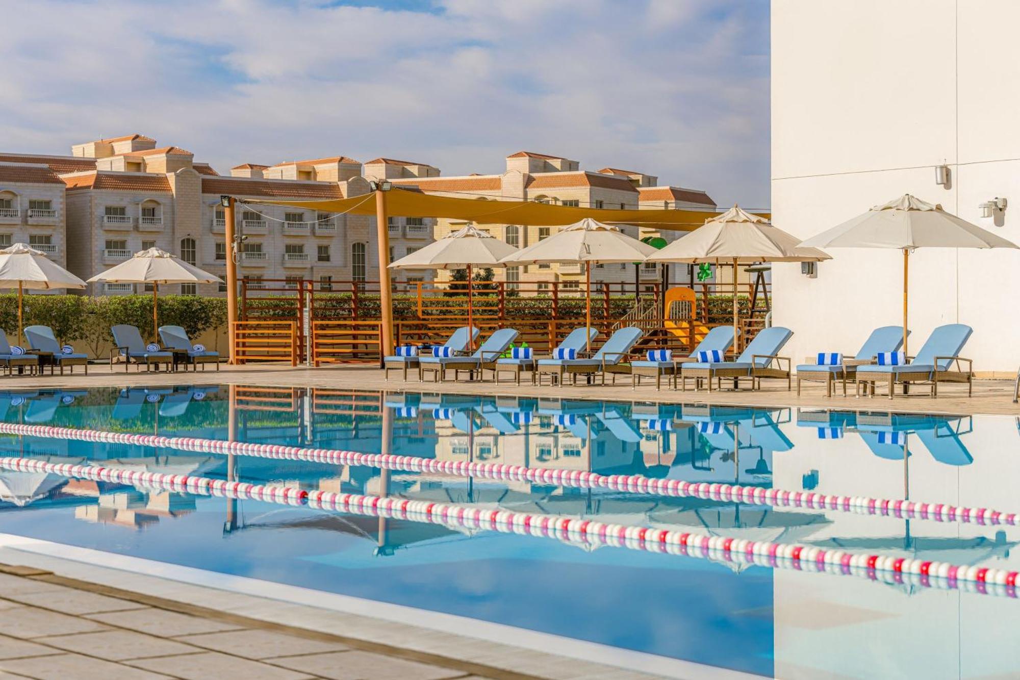Four Points By Sheraton Al Ain Exterior photo The pool at the Athens Olympic Aquatic Centre